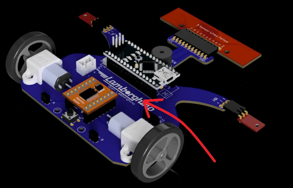 La batería va en el espacio entre el Arduino y el driver de motores